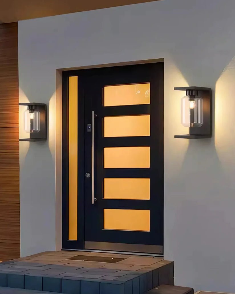 Yobi Wall Light softly illuminating an outdoor wall with serene ambiance