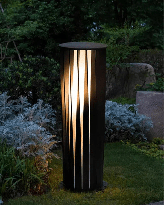 Kūkan Column illuminating a pathway or garden with serene ambiance