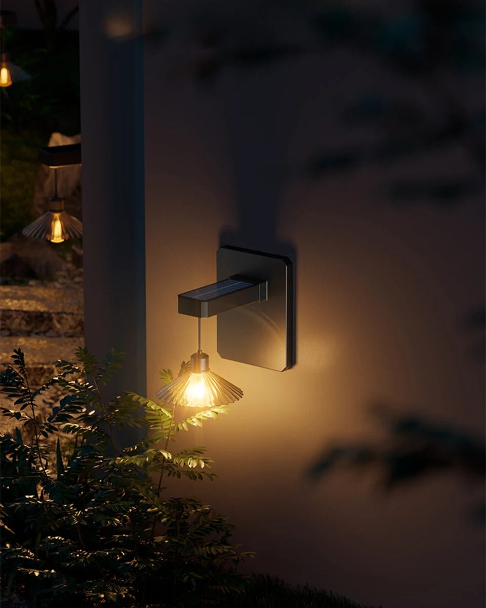Kasa Wall Light softly illuminating an outdoor wall with serene ambiance