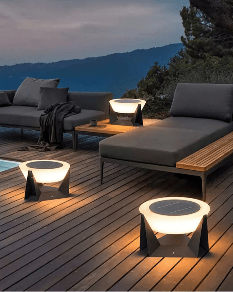 Enso Ground Light illuminating a pathway or garden with serene ambiance
