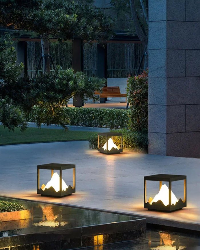 Yama Ground Light illuminating an outdoor space with solar-powered glow and mountain-inspired design.