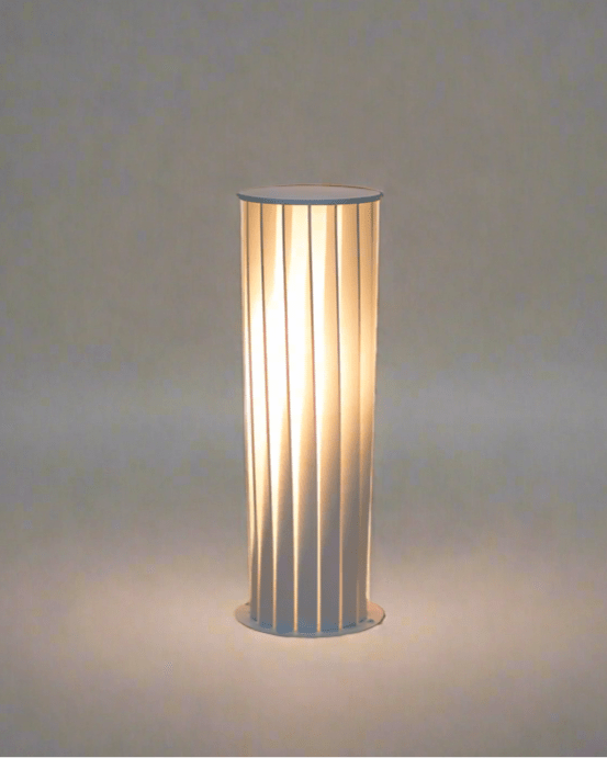 Close-up of Nami Column Snow showcasing minimalist Japandi design with 3000K warm glow