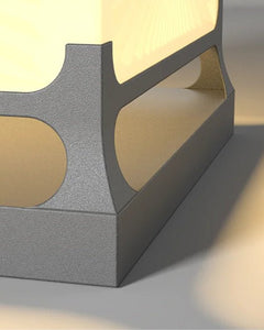 Kado Ground Light close-up showing the elegant base design and solar-powered illumination feature.