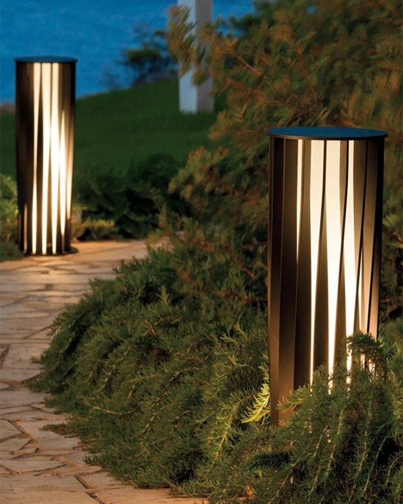 Kūkan Column illuminating a pathway or garden with serene ambiance