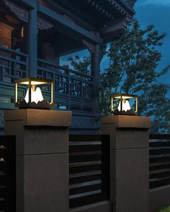 Yama Ground Light illuminating outdoor pillars with a mountain-inspired design at dusk.
